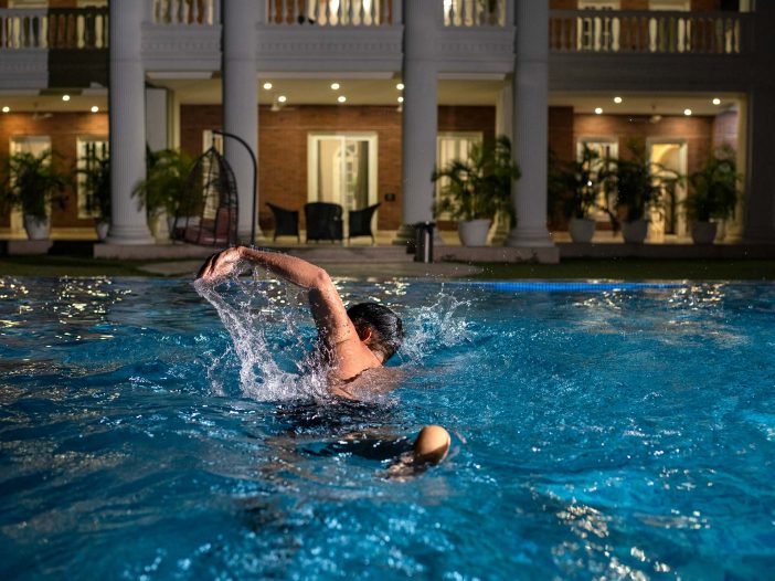 Enjoying the swimming pool at Safe House Wellness Retreat India